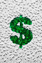 Green Dollar Sign Made Up Of Pills