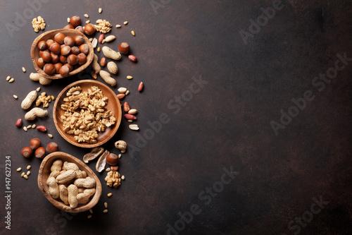 Fotografía Various nuts on stone table