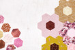 Abstract background of hexagonal pieces of fabric Grandmother's Flower Garden quilt