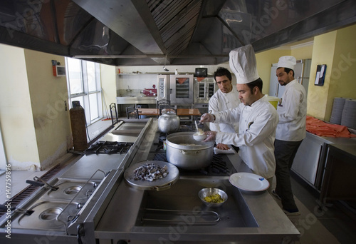 Chefs Cook At A Kitchen Of A Five Star Hotel In Herat Buy This