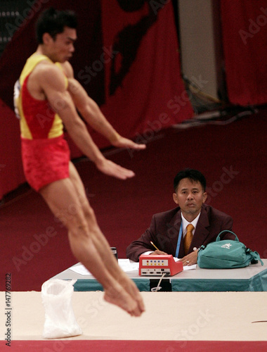 Judge Watches Performance Of China S Liang During Men S Gymnastics