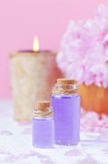  pink color spa concept, lavender oil, vertical