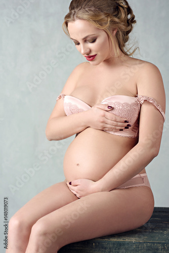 Beautiful Sexy Pregnant Nude - Closeup beautiful pregnant lady in elegant pose isolated on ...