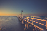 Fototapeta Pomosty - Amazing sunrise on the pier at the seaside. Gdynia Orlowo, Poland