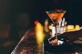 Cocktail drink on night club.