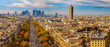 Paris, France - Champs Elysees cityscape. Panorama from the Arc de Triomphe. Blue sky with clouds in autumn. La Defense Financial District in the background.