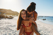 © Jacob Lund - Beautiful females enjoying vacation on beach