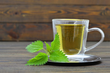 Canvas Print - Nettle tea in the glass cup