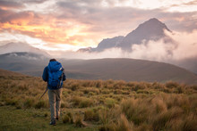 Man Hiking By Mountains, Ecuador, South America 