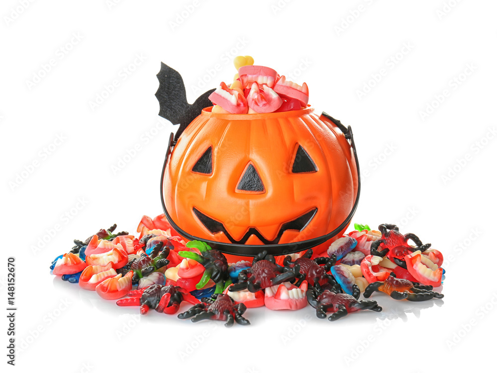 Decorated pumpkin basket with sweet jelly treats