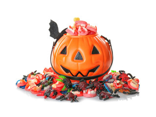 Wall Mural - Decorated pumpkin basket with sweet jelly treats