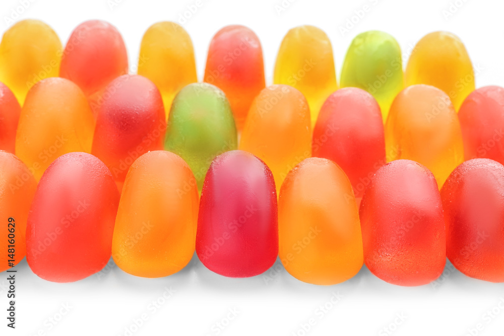 Tasty jelly candies on white background, closeup