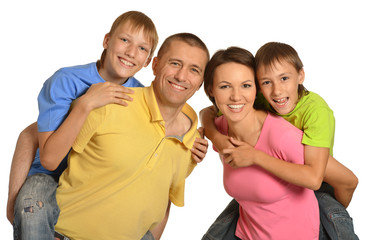 Canvas Print - Happy family with young children on a white background