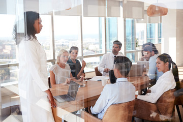 Poster - Group Of Medical Staff Meeting Around Table In Hospital