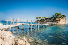 Greece, Zakynthos, Wooden Bridge To The Small Island Agios Sostris, To The Cliffs