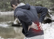 © dream@do - Sport injury, Man with back pain. Pain relief and health care concept.