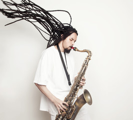 Male saxophonist with dreadlocks 