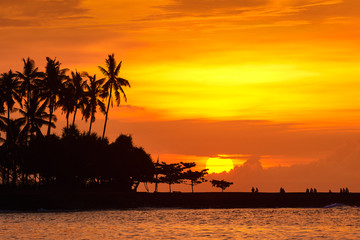 Sticker - People are looking beautiful sunset on tropical beach of Senggigi island Lombok, Indonesia.