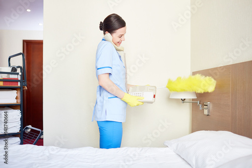 Dusting Furniture Wood Concierge In Uniform And Gloves Dusting Furniture And Talking On Telephone Adobe Stock Concierge In Uniform And Gloves Dusting Furniture And Talking On Dusting Furniture Wood Concierge In Uniform And Gloves Dusting Furniture And Talking On Telephone Adobe Stock Concierge In Uniform And Gloves Dusting Furniture And Talking On