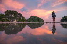 Reflection Of Man Photographer Take Photo Of Summer Landscape With Beautiful Sunset Sky At Ao Nang Beach, Famous Tourist Attraction And Travel Destination Of Krabi Province, Thailand