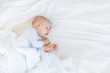 © LIGHTFIELD STUDIOS - Close-up portrait of adorable baby boy sleeping in bed, 1 year old baby concept