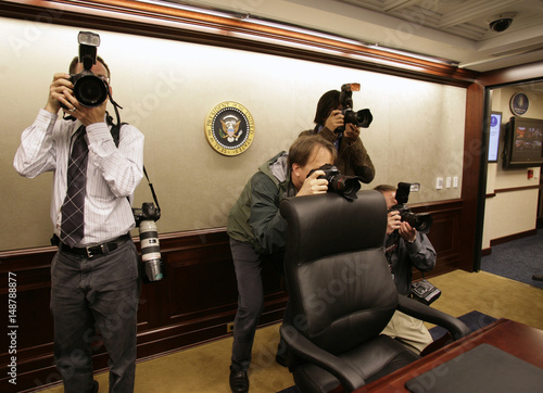 News Photographers Shoot Pictures During A Tour To The Newly
