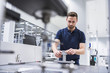 © Westend61 - Man at a machine in testing instrument room
