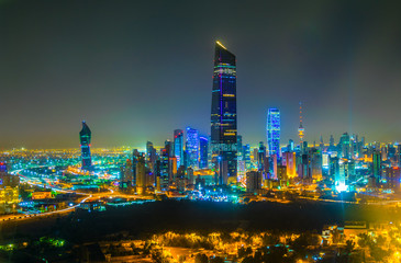 Wall Mural - Night aerial view of the downtown Kuwait dominated by the liberation tower.