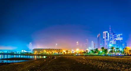 Wall Mural - Skyline of Kuwait during night including the Seif palace and the National assembly building.