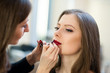 © fotofrol - Makeup artist makes beautiful girl makeover