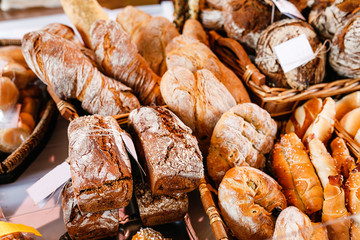 different kind of craft bread for sale at the market