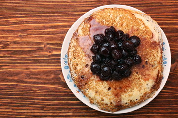 Wall Mural - Delicious pancakes with cherry jam