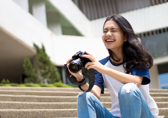 face of asian teenage like to take photo