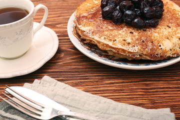 Wall Mural - Delicious pancakes with cherry jam