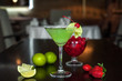 Selection of best selling drinks beer glass of wine cocktails martini mojito and shot short bar blurred background