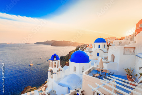Fotografie, Obraz Beautiful Santorini sunset scenery, traditional white architecture, Santorini island, Oia village, Greece, Europe