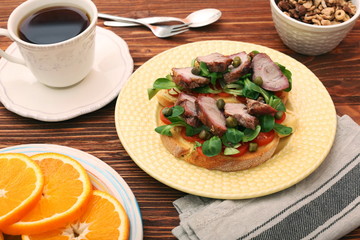 Wall Mural - Open sandwich with pork greens and capers