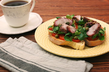 Wall Mural - Open sandwich with pork greens and capers