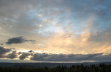Fototapeta Tęcza - Beautiful Sunset over Mountains

