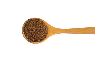 Wall Mural - Pile of coffee powder in wooden spoon isolated on white background.