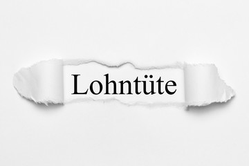 Canvas Print - Lohntüte auf weißen gerissenen Papier