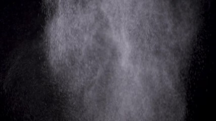 Wall Mural - white powder exploding isolated on black
