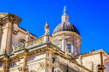 Wall Mural - Cathedral exterior Dubrovnik. / View at marble architectural details on cathedral facade in Dubrovnik town, Croatia.