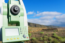 Close Up Of Modern Surveyor Equipment, Theodolite Or Tacheometer  Used In Surveying And Building Construction For Precise Measurement. Total Station Outdoor At Construction Site. Copy Space.