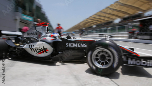 Mclaren Mercedes F1 Driver Kimi Raikkonen Of Finland Speeds His