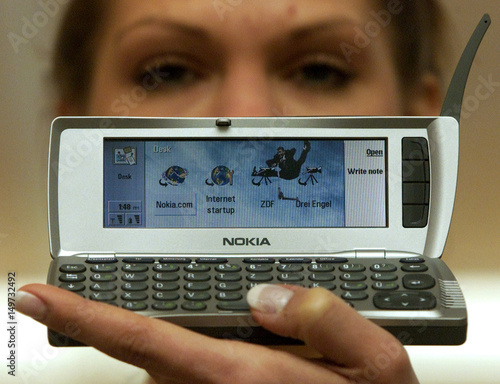A Model Displays Nokia S New Mobile Phone 9210 Communicator Prior