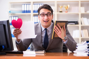 businessman in saint valentine concept in office