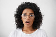 © wayhome.studio  - Human emotions, feelings and facial expressions. What is going on? Stressed anxious funny looking dark-skinned woman waiting for something to happen, after received unpleasant unexpected news