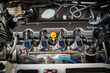 © Goodvibes Photo - The powerful engine of a car. Internal design of engine with combustion and valve, dark tone