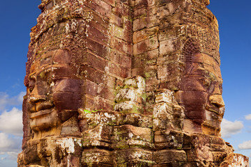 Wall Mural - Stone faces of the famous Bayon temple in Angkor Thom complex, Siem Reap, Cambodia.